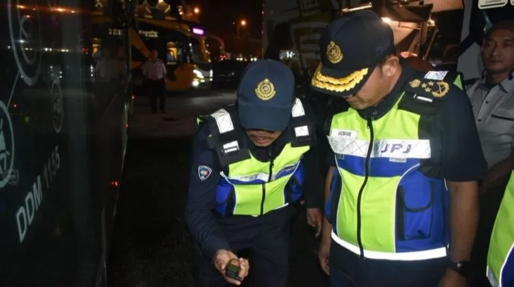 JPJ officers conducting road safety advocacy with bus drivers at Lembah Sireh Terminal Kota Bharu