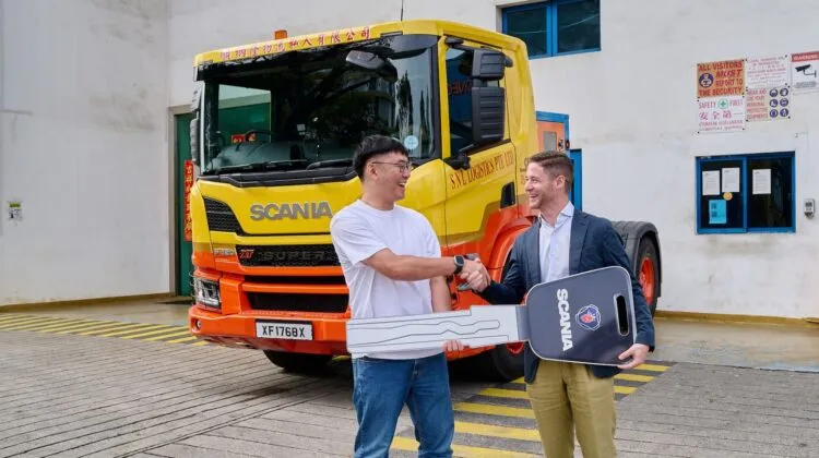 Scania Singapore Country Manager Oscar Wyckman handing over P420 Super key