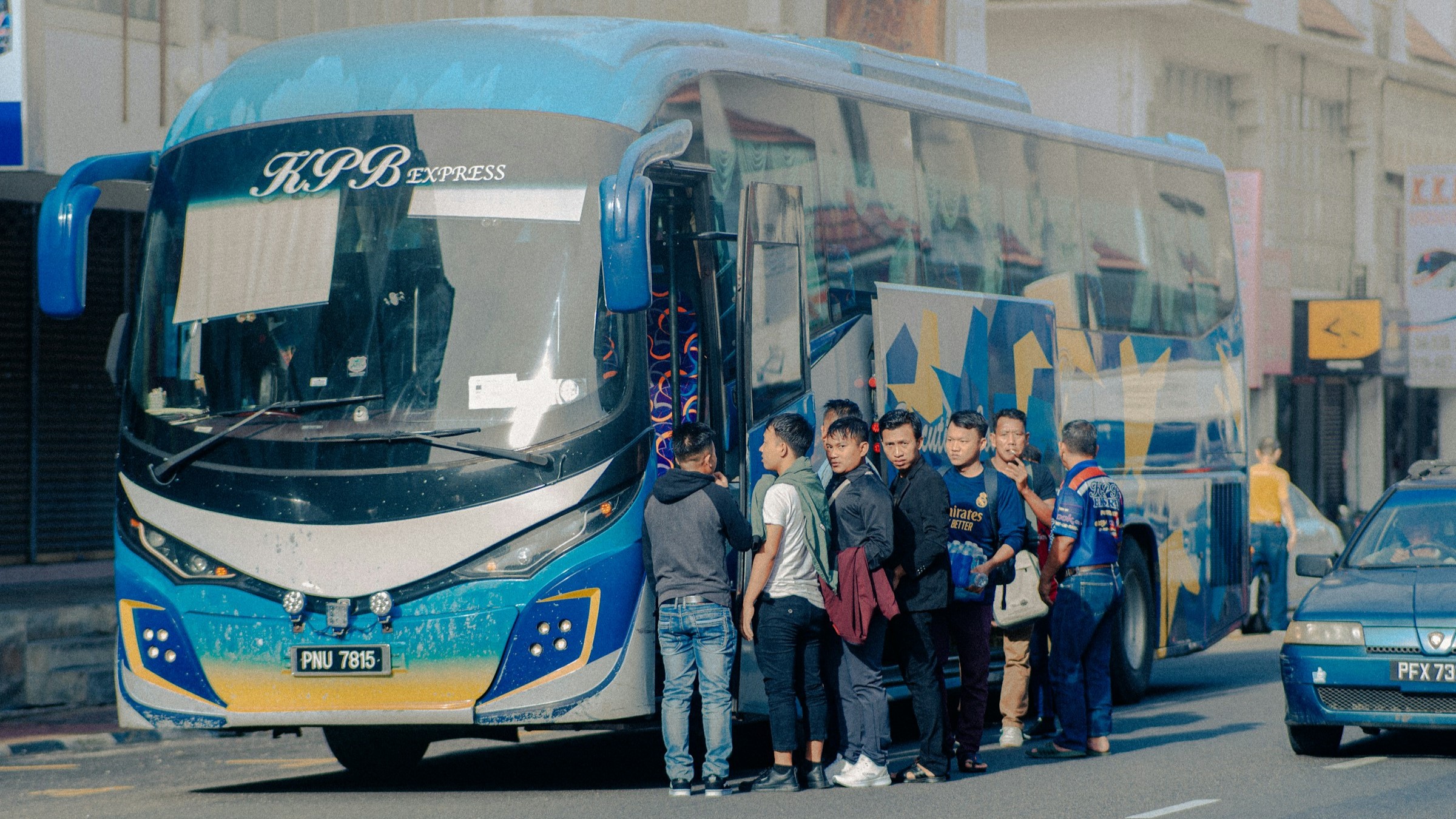 Tour bus in Malaysia. Photo/Image Credit: Guberan Thanirmalai on Unsplash