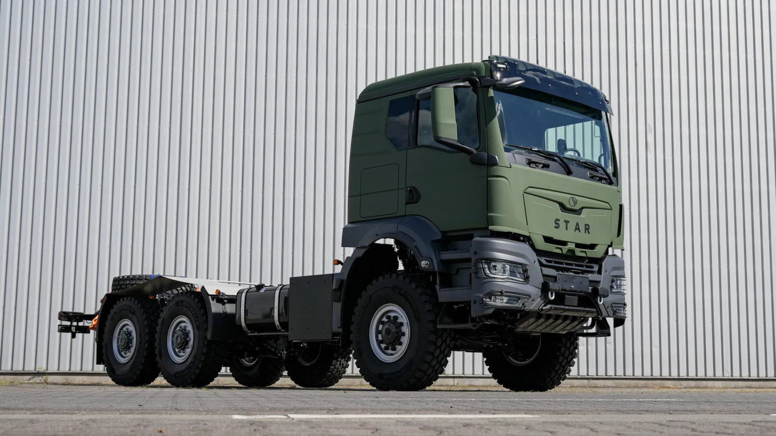 Green military chassis truck based on a MAN TGS 6x6 featuring the STAR emblem on the front cab. (Photo: MAN Truck & Bus)
