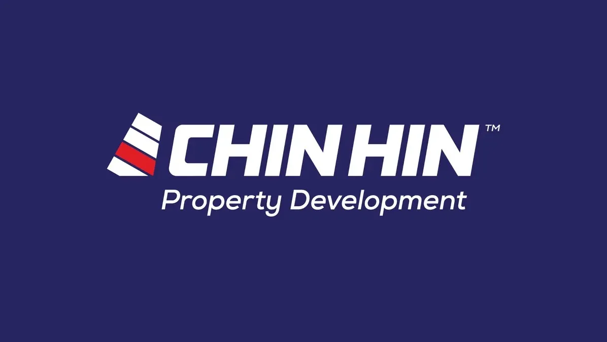 The red, white, and dark blue corporate logo of Chin Hin Property Development displayed on a solid dark blue background.
